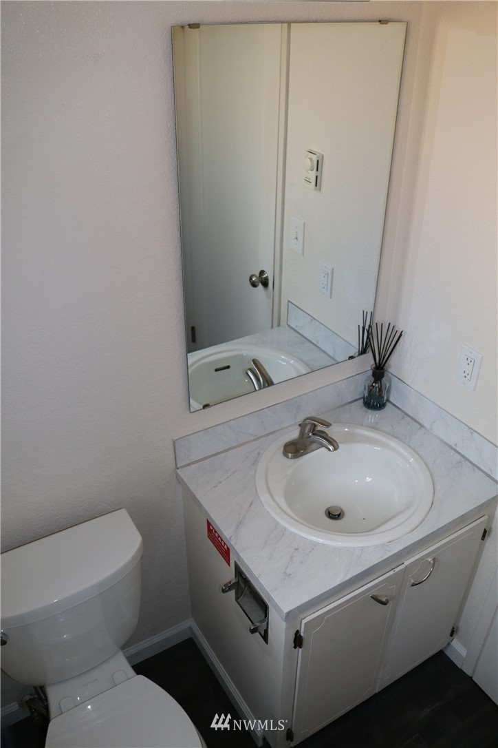 6513 Cady Road Everett, WA 98203 - Photo 7 of 11 a bathroom with a sink and a toilet