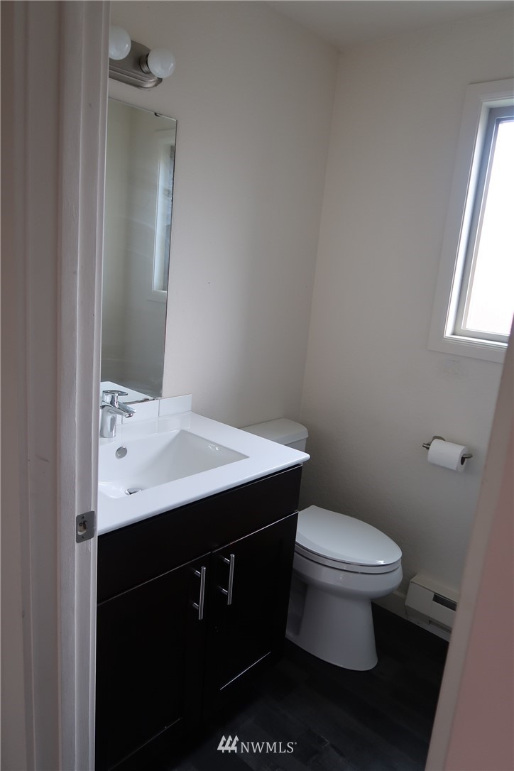 6513 Cady Road Everett, WA 98203 - Photo 8 of 11 a bathroom with a sink and a toilet