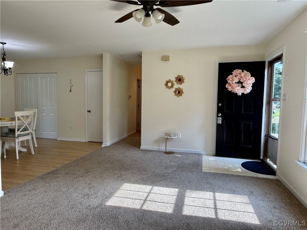 4825 Wilconna Road Chesterfield, VA 23832 - Photo 3 of 18 a view of an entryway with a chandelier