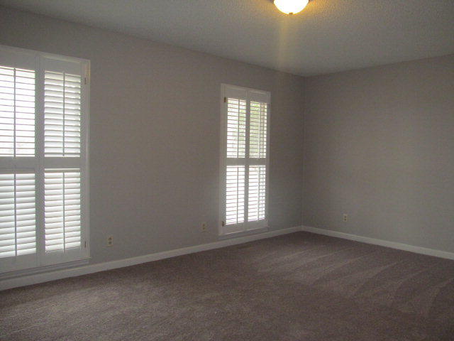 5016 Hartley Bridge Road Macon, GA 31216 - Photo 11 of 27 an empty room with a window