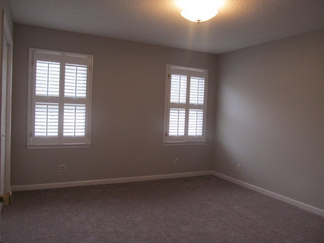 5016 Hartley Bridge Road Macon, GA 31216 - Photo 13 of 27 an empty room with a window