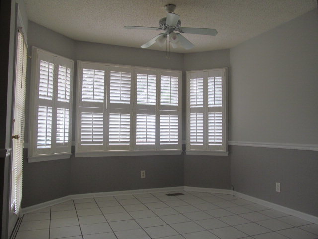 5016 Hartley Bridge Road Macon, GA 31216 - Photo 6 of 27 a view of an empty room with a window