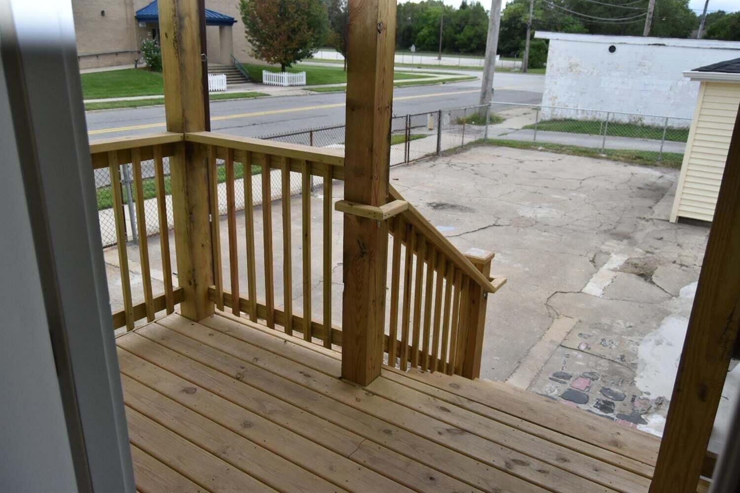 5664 Walter Avenue Hammond, IN 46320 - Photo 7 of 13 a view of porch with wooden floor