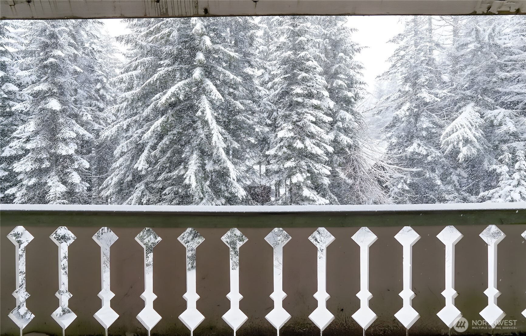 220 Tanner Way, Unit 206 Snoqualmie Pass, WA 98068 - Photo 4 of 37 a view of wooden fence
