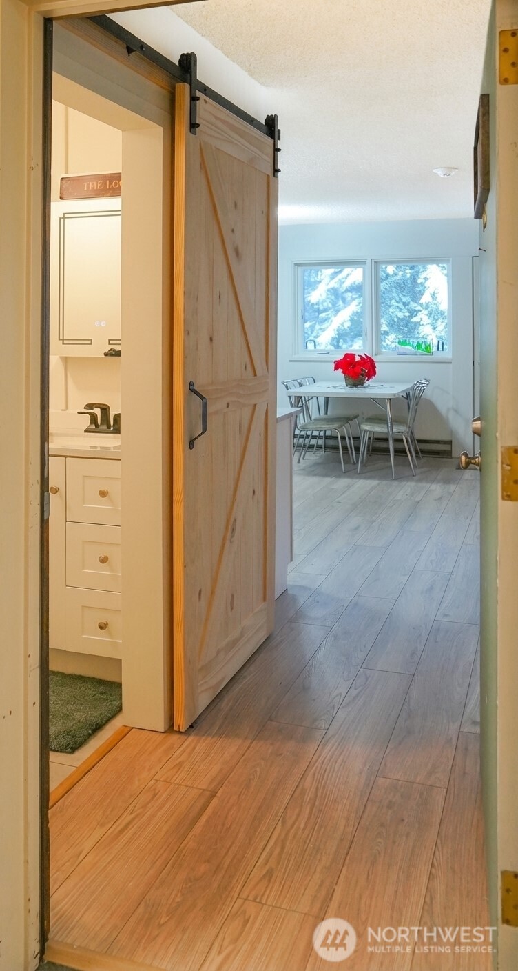 220 Tanner Way, Unit 206 Snoqualmie Pass, WA 98068 - Photo 6 of 37 a view of an entryway and livingroom
