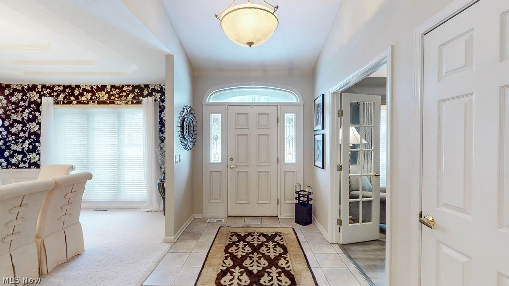 36845 Aberdeen Lane Solon, OH 44139 - Photo 2 of 24 Entryway featuring baseboards and light tile patterned floors