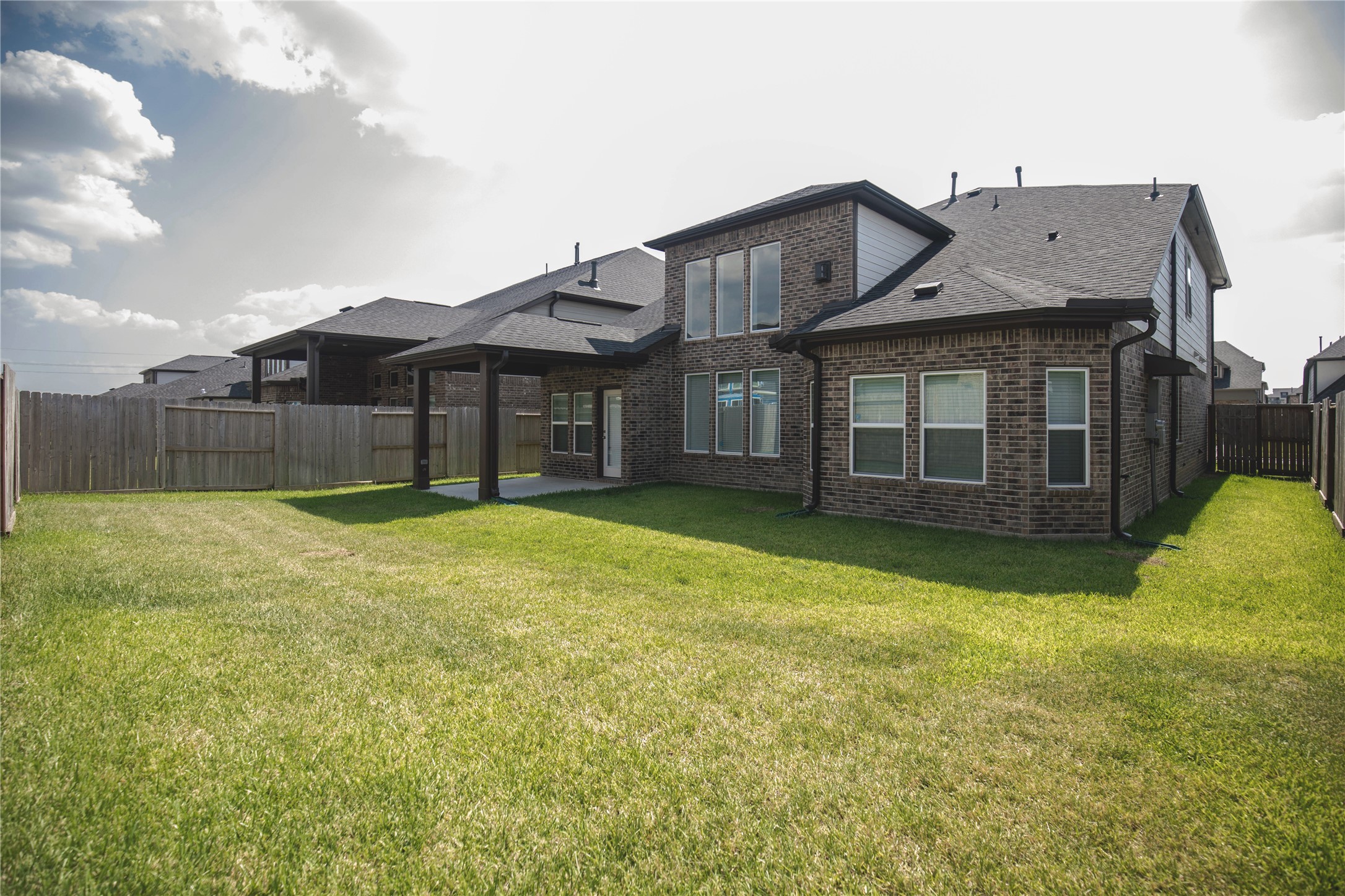 6307 Grand Drift Court Katy, TX 77494 - Photo 23 of 24 Nice sized back yard. House has the sprinkler system front and back.