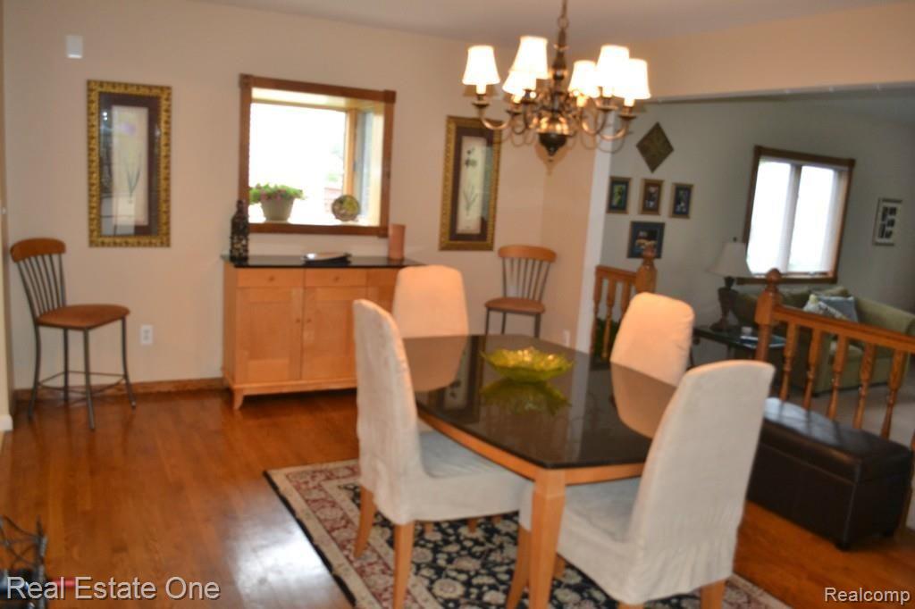 716 Dressler Lane Rochester, MI 48307 - Photo 5 of 17 Beautiful hardwood floors in dining room
