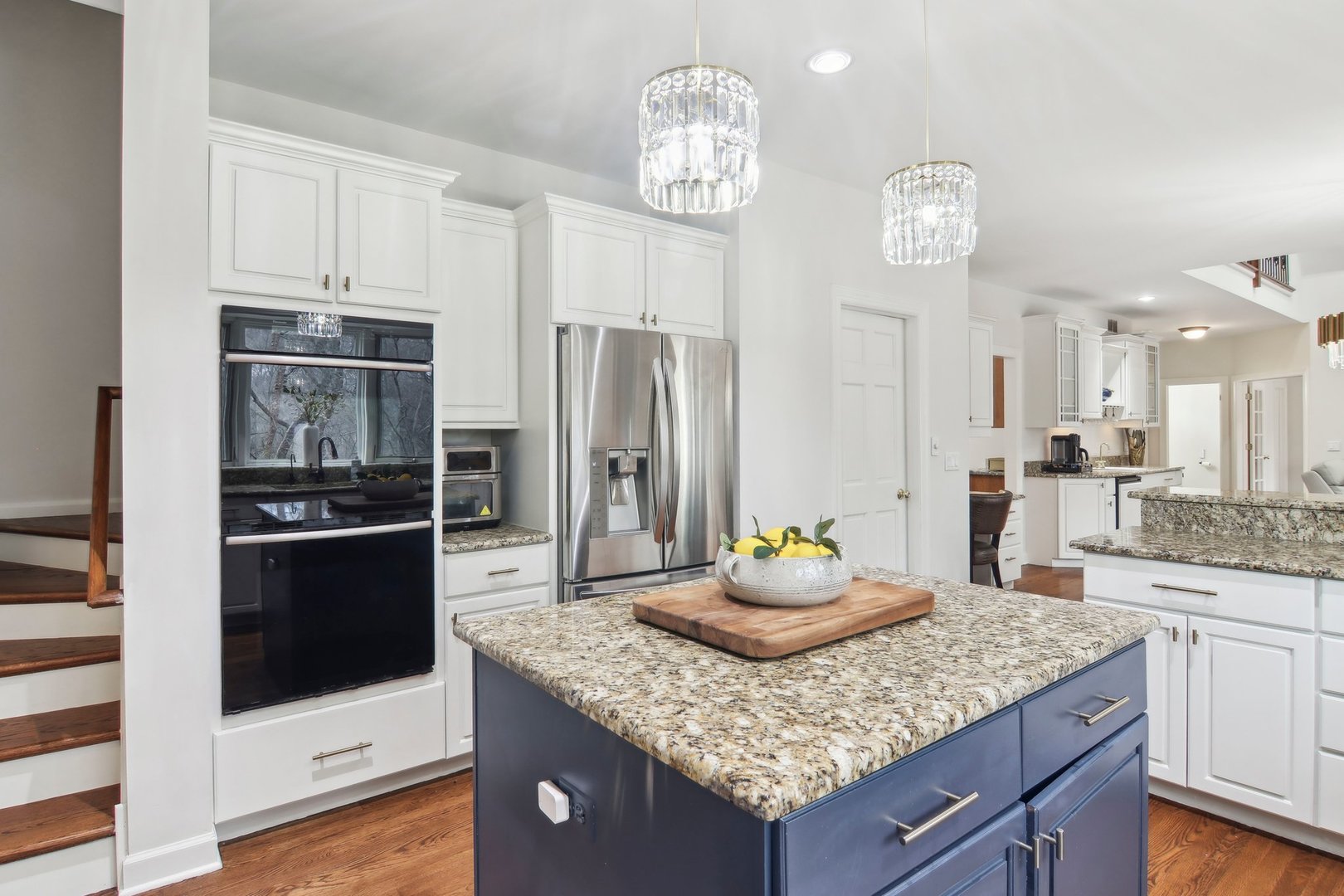 1005 Bridle Lane Cary, IL 60013 - Photo 15 of 64 a kitchen with stainless steel appliances kitchen island granite countertop a sink and cabinets