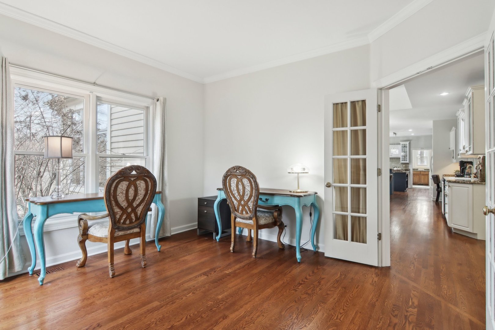 1005 Bridle Lane Cary, IL 60013 - Photo 21 of 64 a dining room with furniture wooden floor carpet and a chandelier