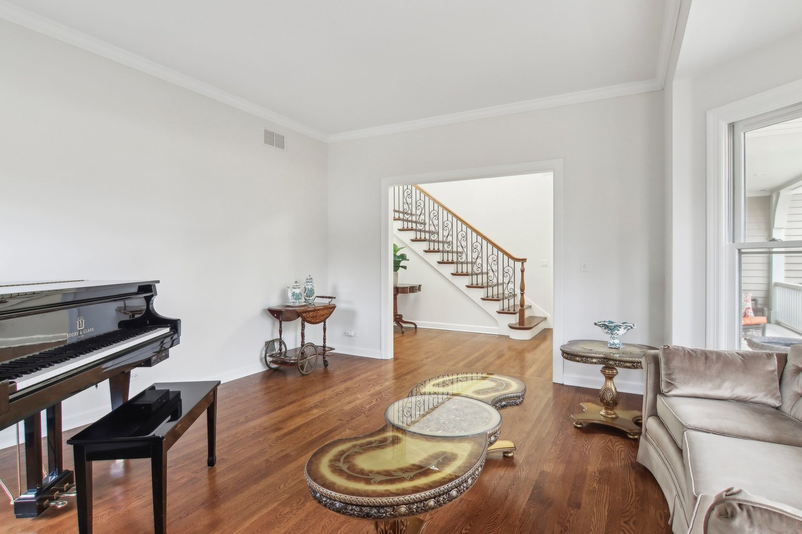 1005 Bridle Lane Cary, IL 60013 - Photo 4 of 64 a living room with furniture and a wooden floor