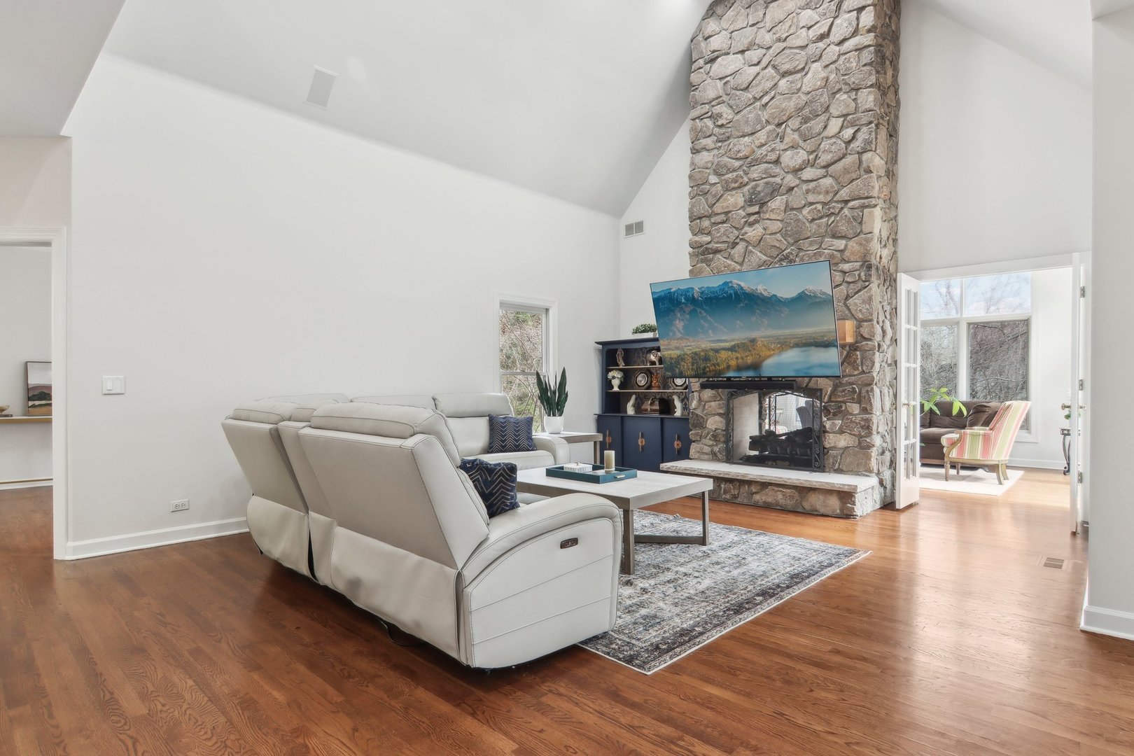 1005 Bridle Lane Cary, IL 60013 - Photo 8 of 64 a living room with furniture and a fireplace