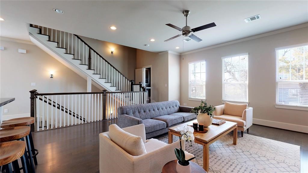 2724 Rutland Street Houston, TX 77008 - Photo 10 of 29 a living room with furniture ceiling fan and a window