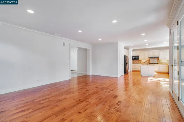a kitchen with granite countertop a sink and window