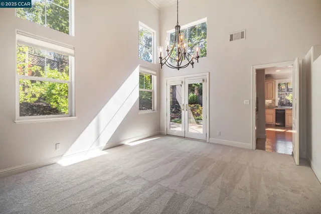 a view of a hallway with windows