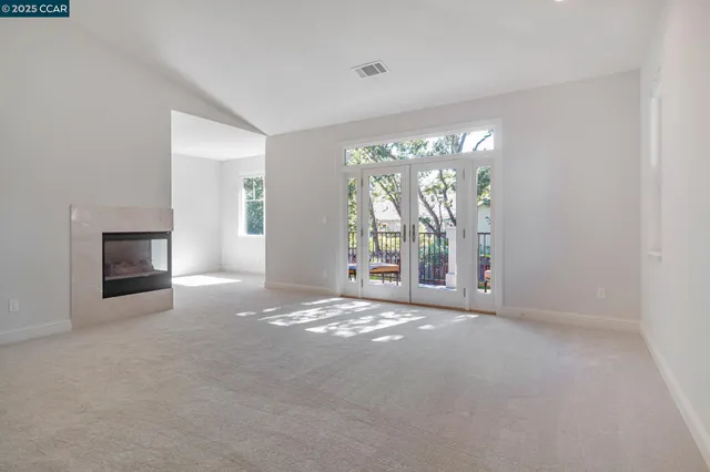 a bathroom with a tub shower and sink