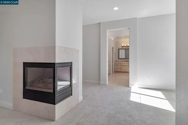 a bathroom with double sink and a mirror