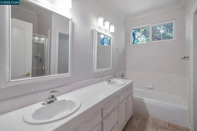 a view of a house with sitting area and garden