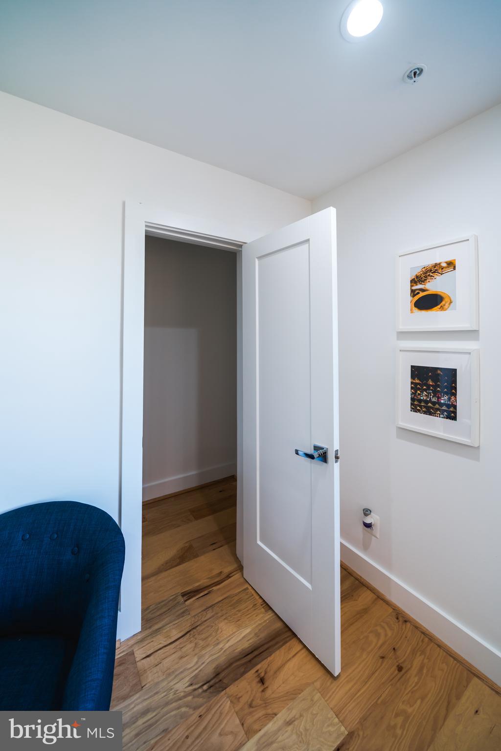 400 Newcomb Street Southeast, Unit 6 Washington, DC 20032 - Photo 16 of 29 a view of a hallway with wooden floor and closet