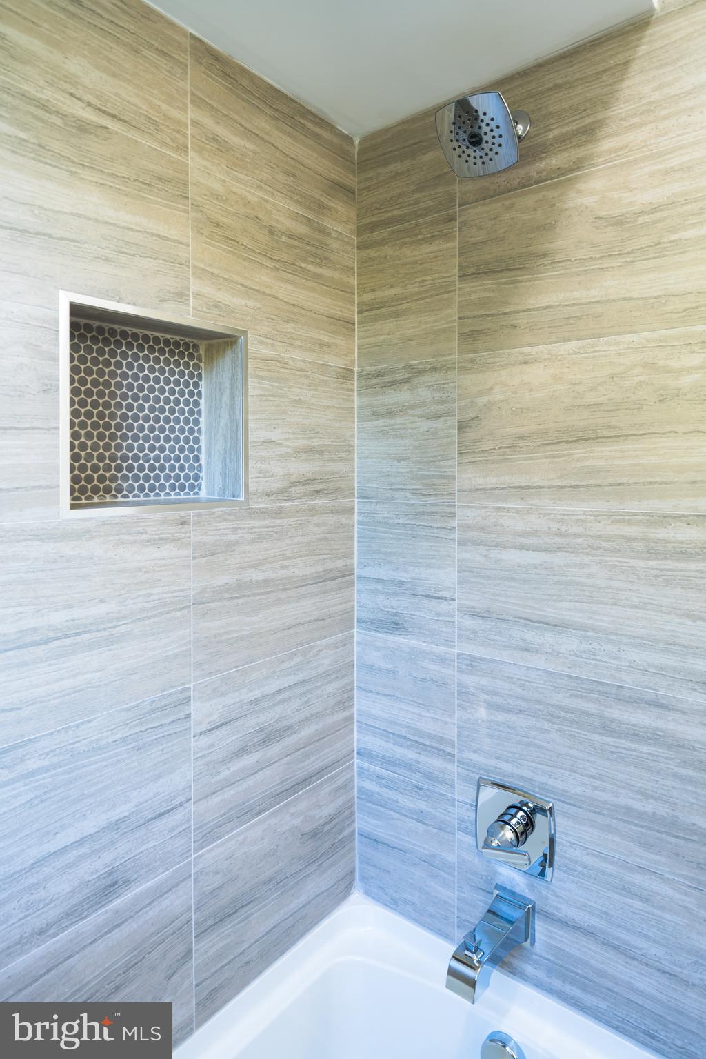 400 Newcomb Street Southeast, Unit 6 Washington, DC 20032 - Photo 23 of 29 a bathroom with a shower