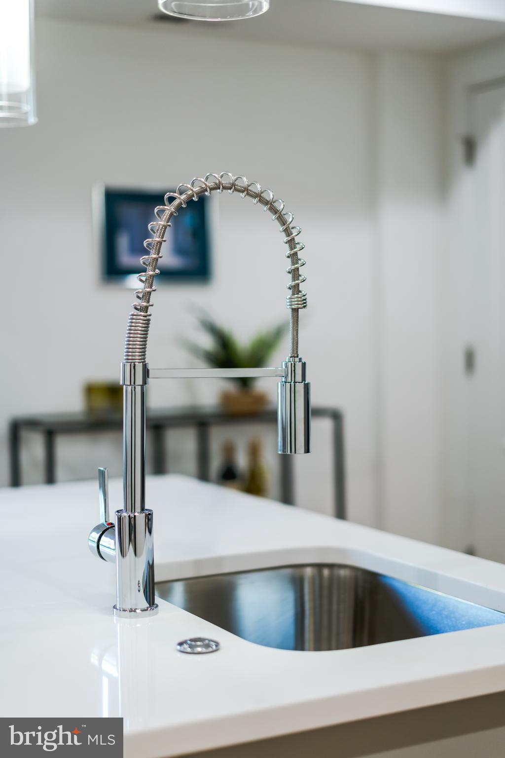 400 Newcomb Street Southeast, Unit 6 Washington, DC 20032 - Photo 10 of 29 a close view of sink and tap