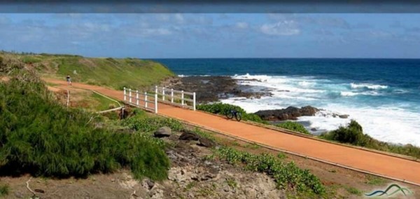 5609 Honua Road, Unit 1 Kapaa, HI 96746 - Photo 16 of 24 a view of a lake from a balcony