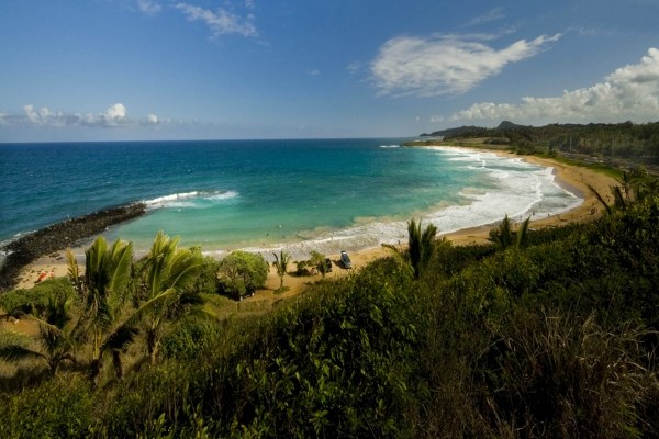 5609 Honua Road, Unit 1 Kapaa, HI 96746 - Photo 17 of 24 a view of an ocean and beach