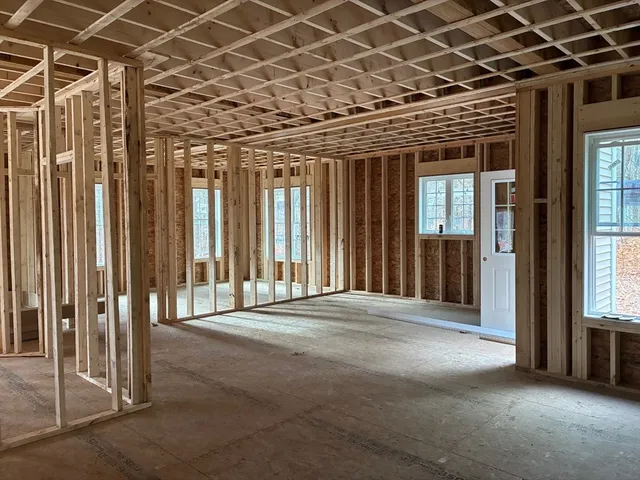 a view of a room with wooden walls
