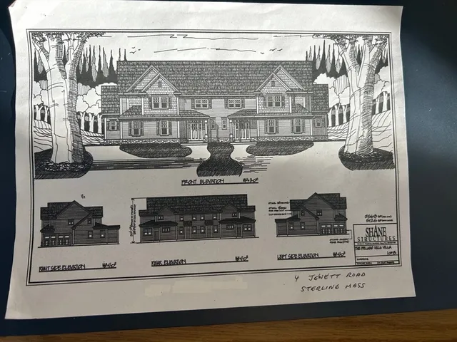 a view of a fireplace with wooden floor