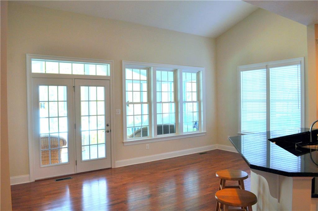 113 Coventry Drive McKees Rocks, PA 15136 - Photo 8 of 23 Morning room with loads of windows for an abundance of natural light! Double French doors lead to three season room.
