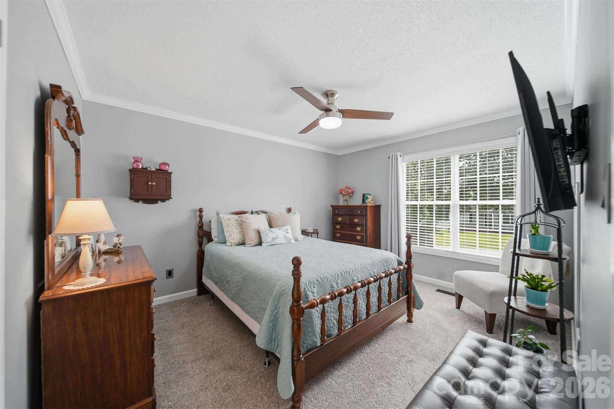 2104 Sheffield Court Northwest Conover, NC 28613 - Photo 14 of 25 a bed room with a bed and a window