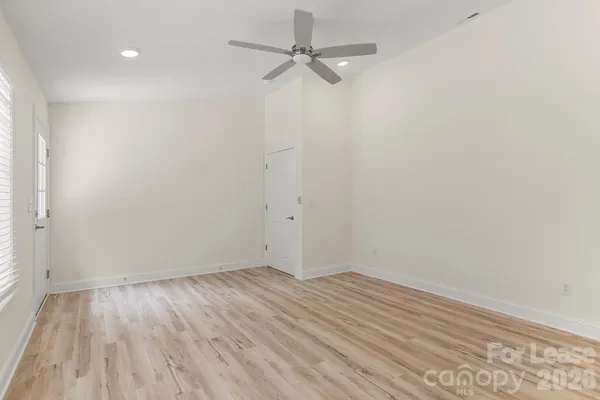 a bathroom with a sink toilet vanity and shower