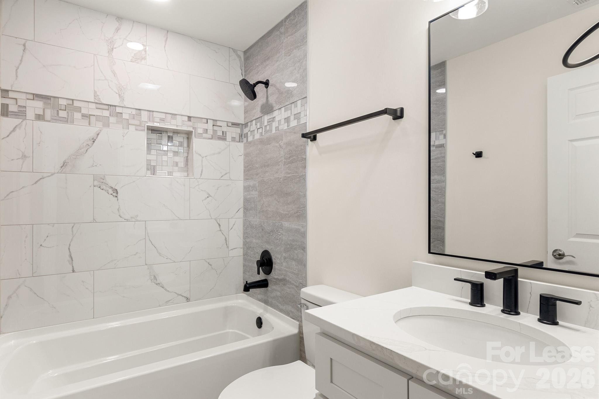 116 Maple Grove Church Road Matthews, NC 28104 - Photo 30 of 41 a bathroom with a sink and a mirror