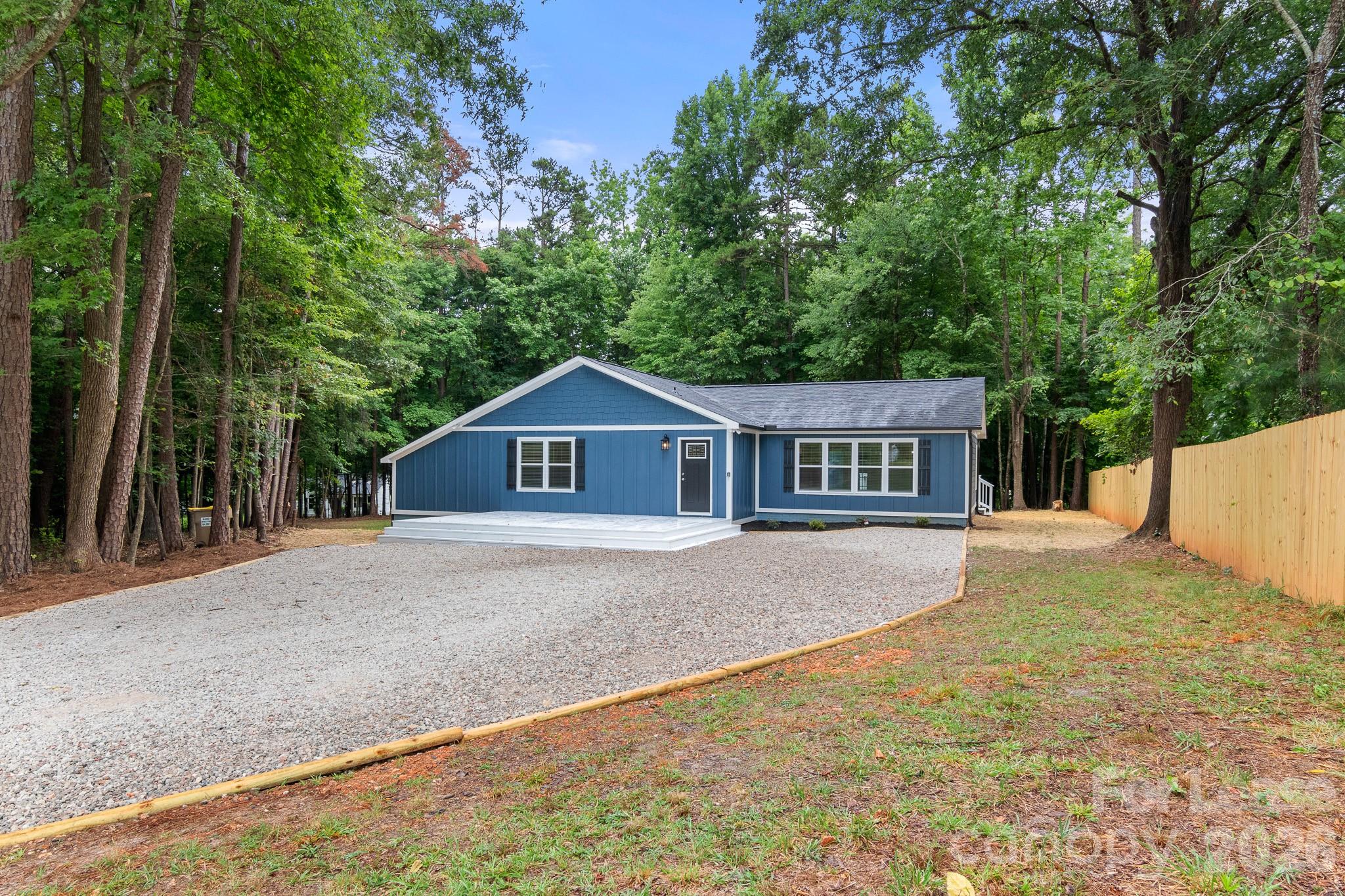116 Maple Grove Church Road Matthews, NC 28104 - Photo 38 of 41 a front view of a house with yard