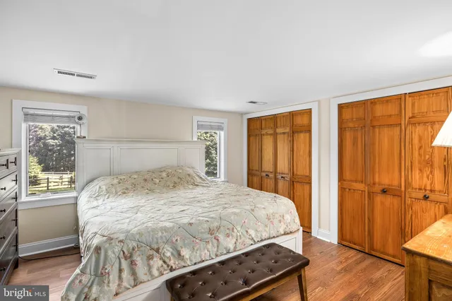 a view of a house with backyard floor and wooden floor
