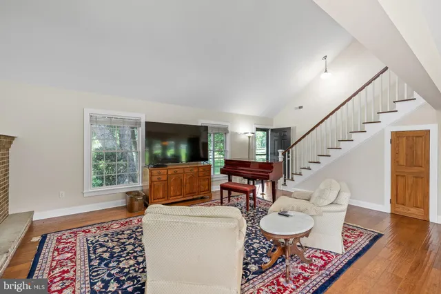 a dining room with furniture window wooden floor