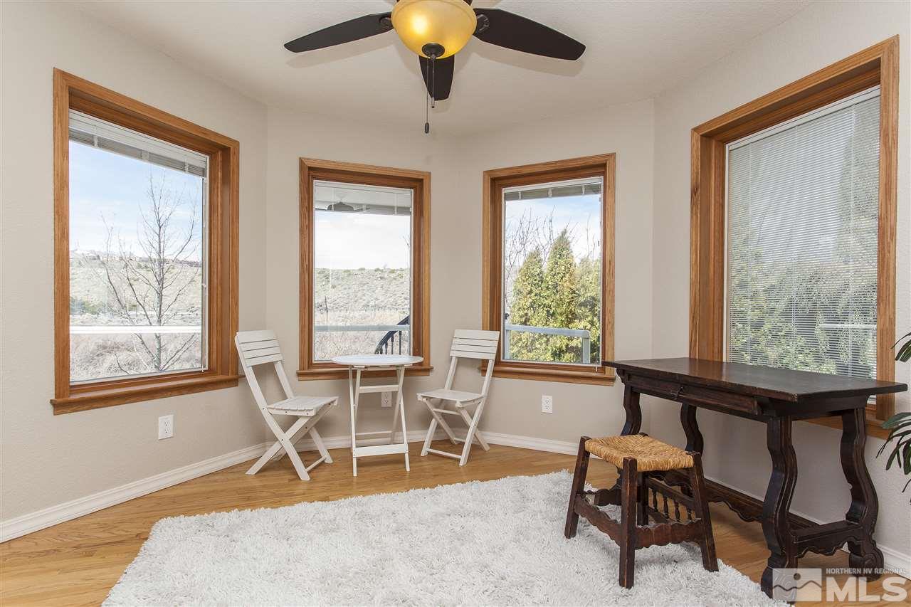 3985 Riverhaven Drive Reno, NV 89519 - Photo 13 of 25 a dining room with furniture and windows