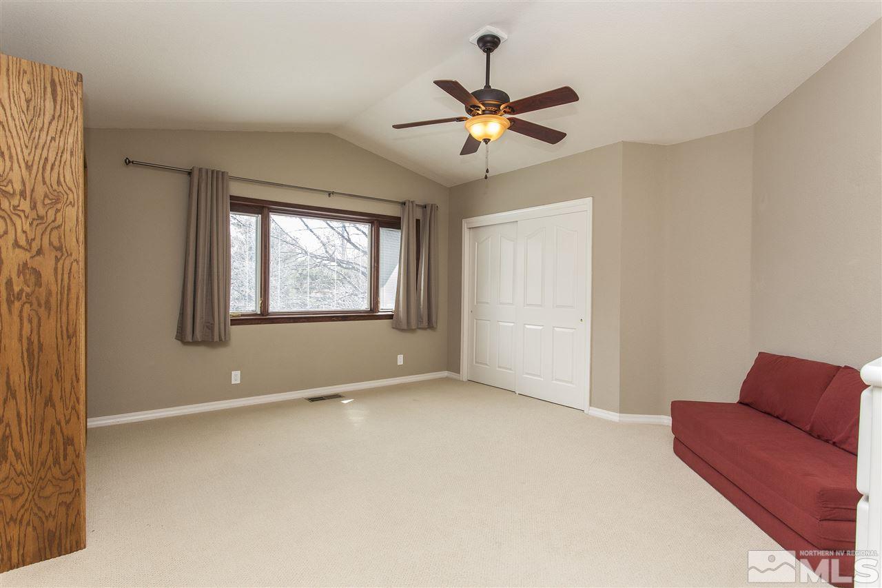 3985 Riverhaven Drive Reno, NV 89519 - Photo 17 of 25 a view of room with window and ceiling fan