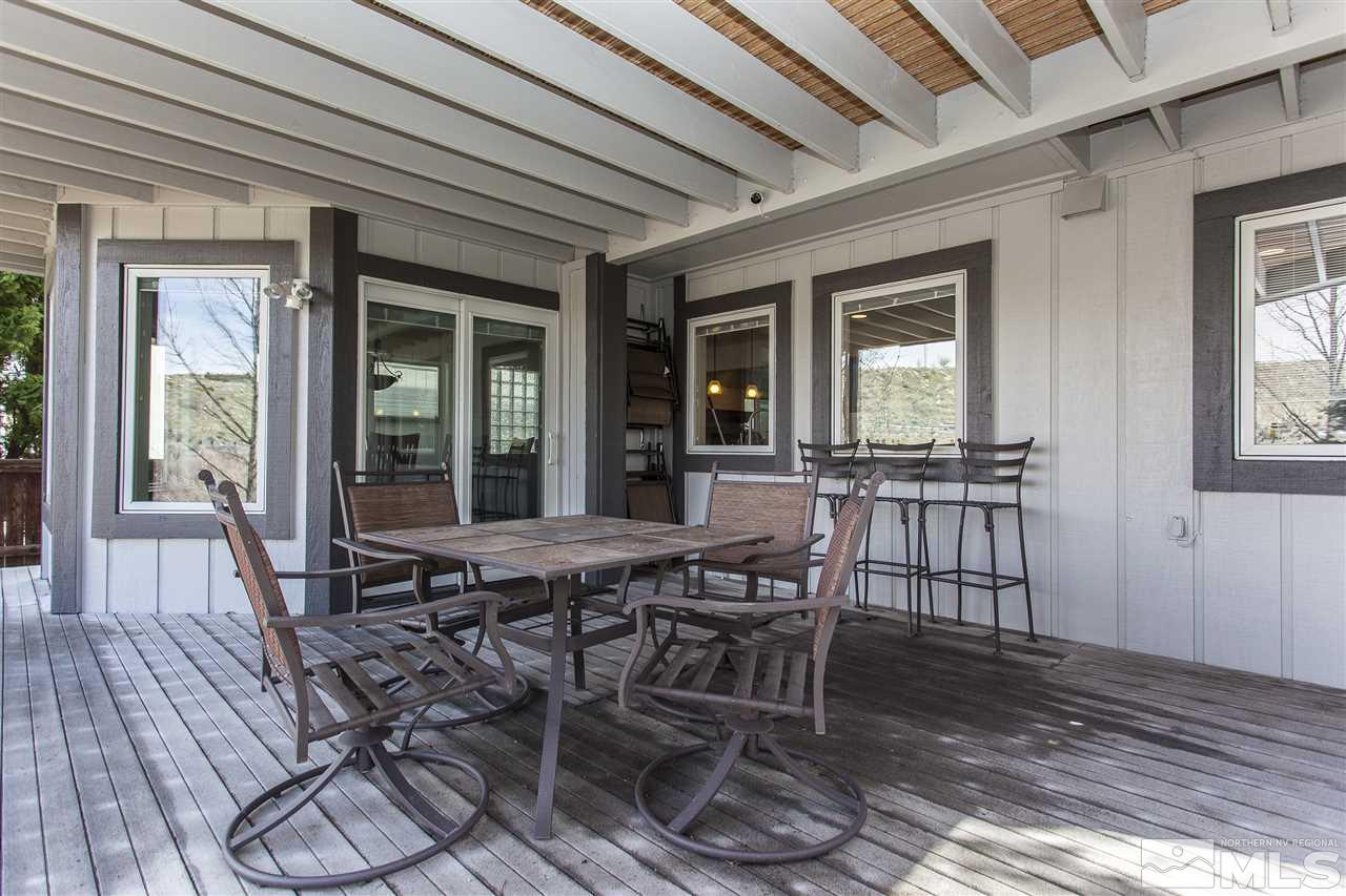 3985 Riverhaven Drive Reno, NV 89519 - Photo 24 of 25 a view of a dining room with furniture window and wooden floor