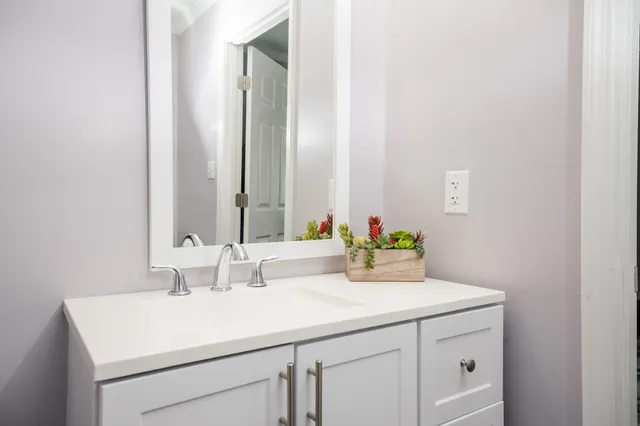 a bathroom with a sink and toilet
