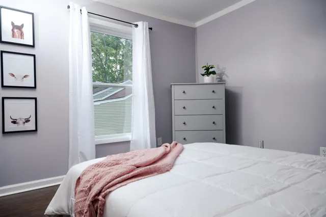 a view of balcony with wooden floor