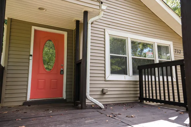 a front view of a house with a door