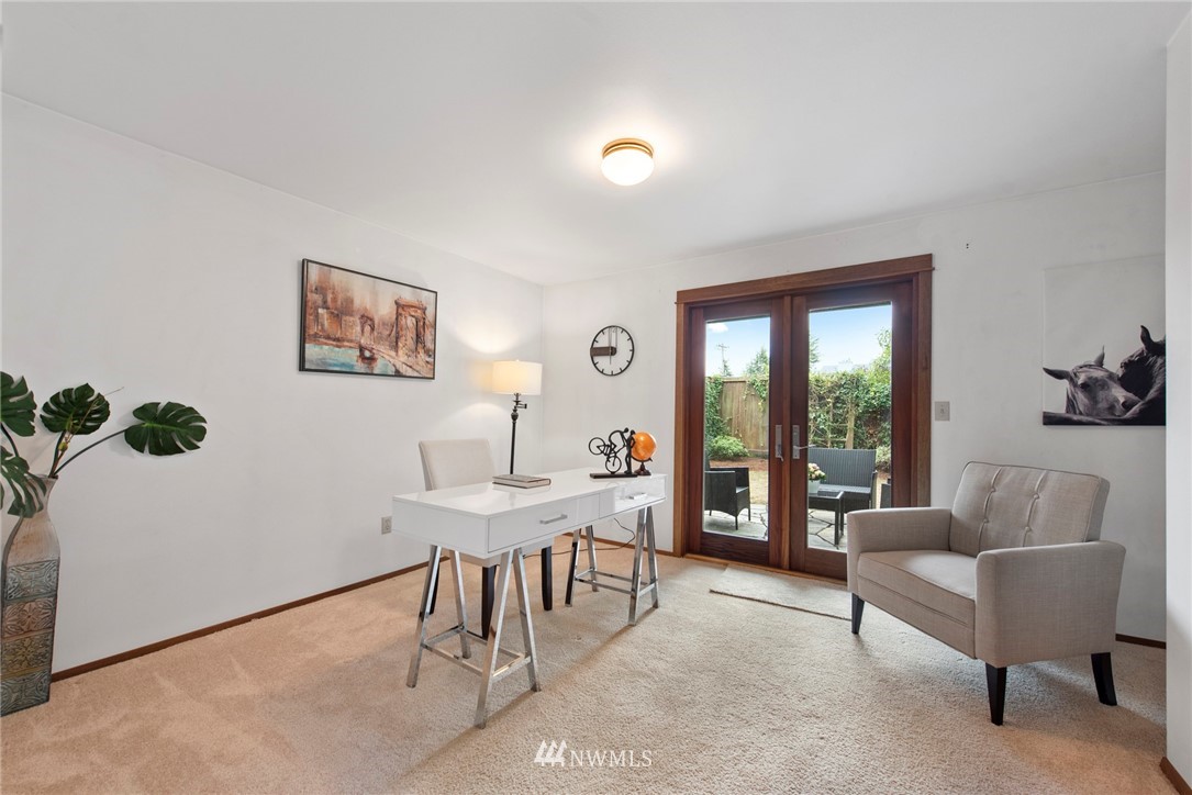 723 North 87th Street Seattle, WA 98103 - Photo 17 of 29 a work room with furniture and a large window