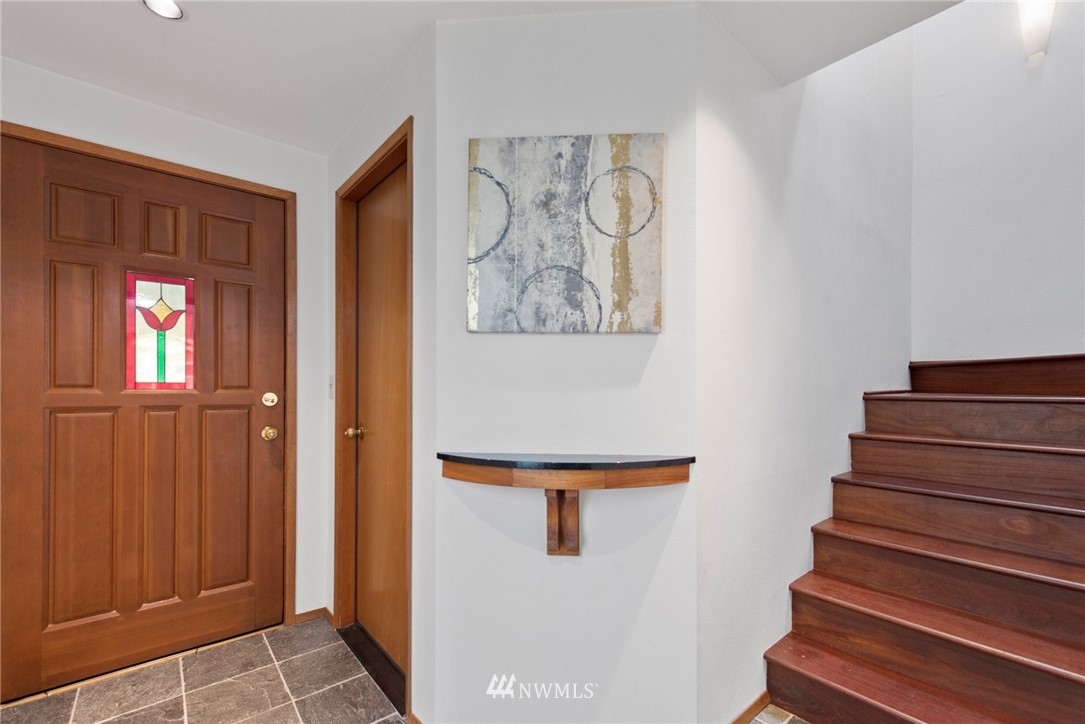 723 North 87th Street Seattle, WA 98103 - Photo 20 of 29 a view of staircase with wooden floor