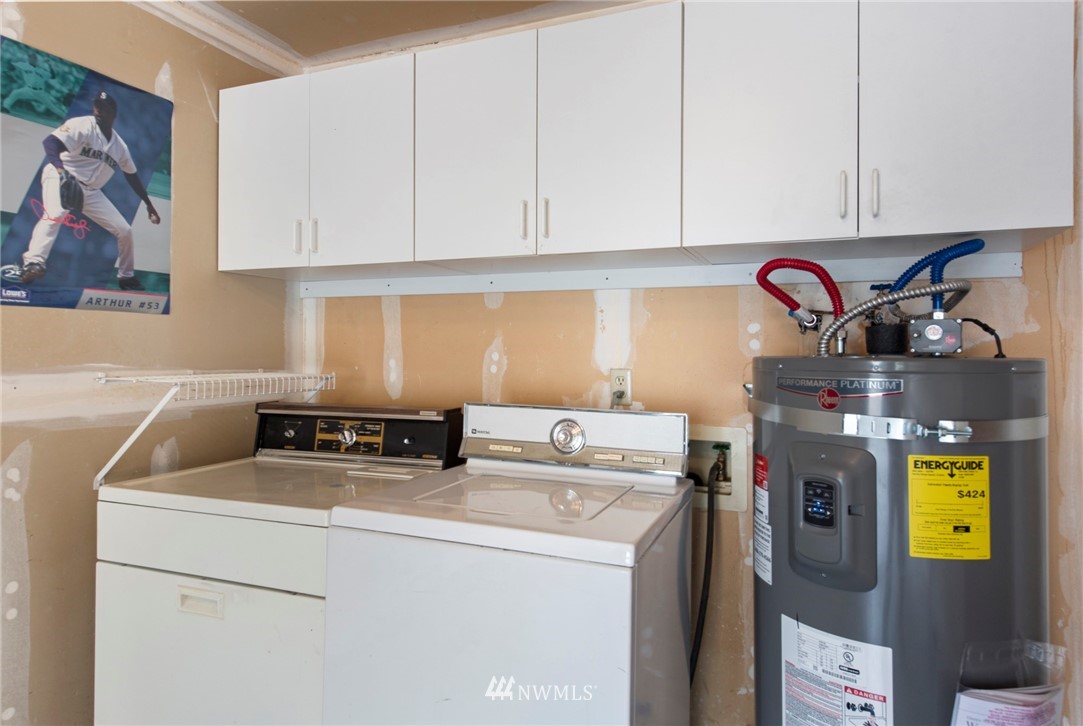 723 North 87th Street Seattle, WA 98103 - Photo 21 of 29 a utility room with dryer and washer