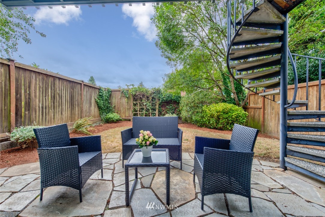 723 North 87th Street Seattle, WA 98103 - Photo 24 of 29 a outdoor view with a sitting space