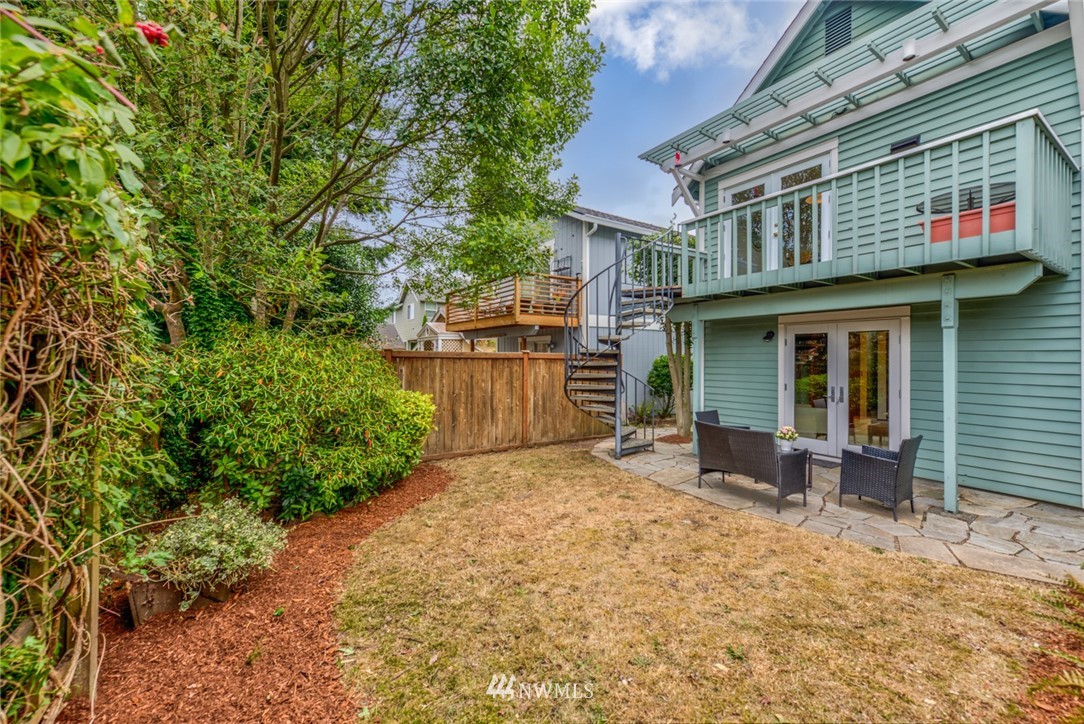 723 North 87th Street Seattle, WA 98103 - Photo 25 of 29 a view of a house with a patio