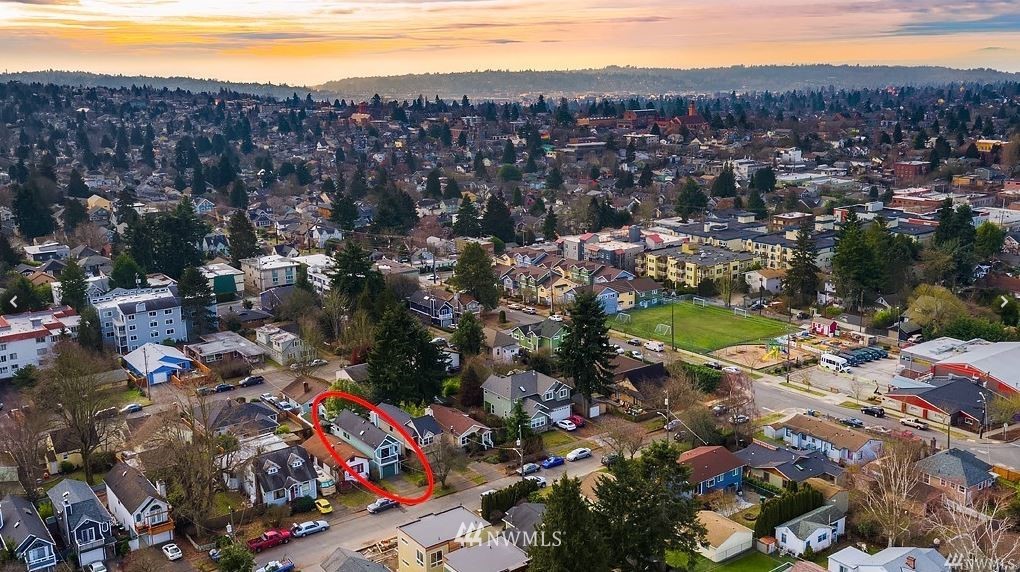 723 North 87th Street Seattle, WA 98103 - Photo 28 of 29 a view of a city with mountains in the background