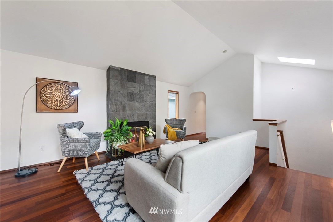 723 North 87th Street Seattle, WA 98103 - Photo 10 of 29 a living room with furniture and a wooden floor