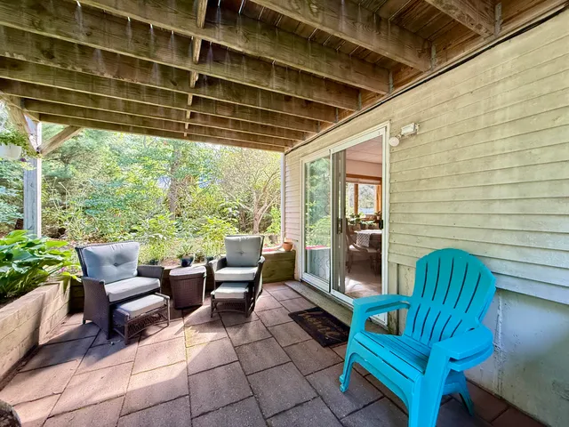 a outdoor living space with patio furniture and a potted plant